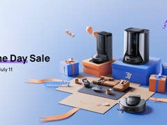 Schwarze und graue Roboterstaubsauger und Reinigungsgeräte auf bunten Geschenkboxen; Text 'Prime Day Sale, 8. - 11. Juli'.