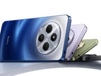 Xiaomi Redmi 14C Smartphones in Blau, Grün und Lila, auf einer gebogenen Oberfläche gestapelt.