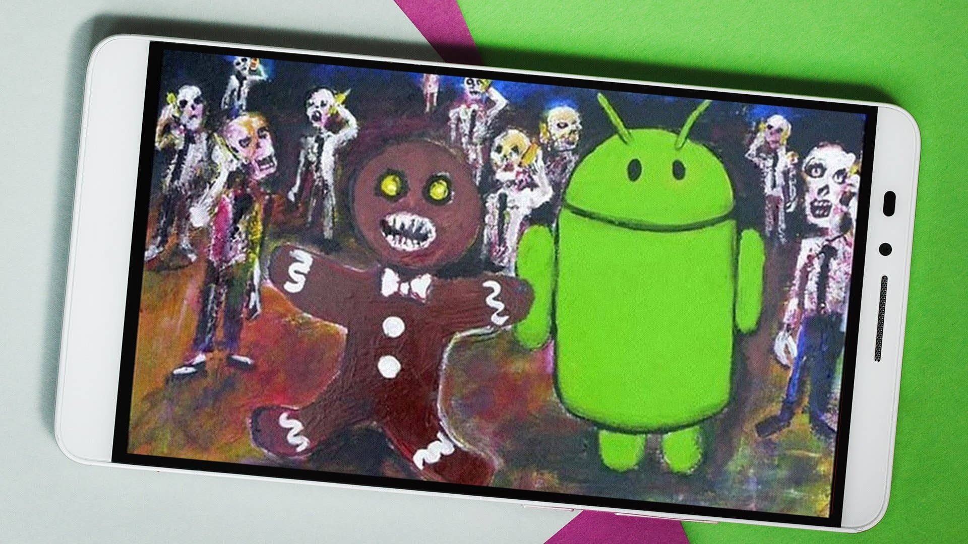 Ein Smartphone zeigt eine bunte Zeichnung eines Lebkuchenmanns und eines Android-Roboters unter zombieähnlichen Figuren. Ein Smartphone zeigt eine bunte Zeichnung eines Lebkuchenmanns und eines Android-Roboters unter zombieähnlichen Figuren.