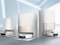 Drei Dreame-Roboterstaubsauger in einer modernen, minimalistischen Umgebung.