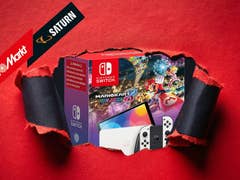 Nintendo Switch OLED-Box mit Mario Kart 8 Deluxe und Logos von Media Markt und Saturn.