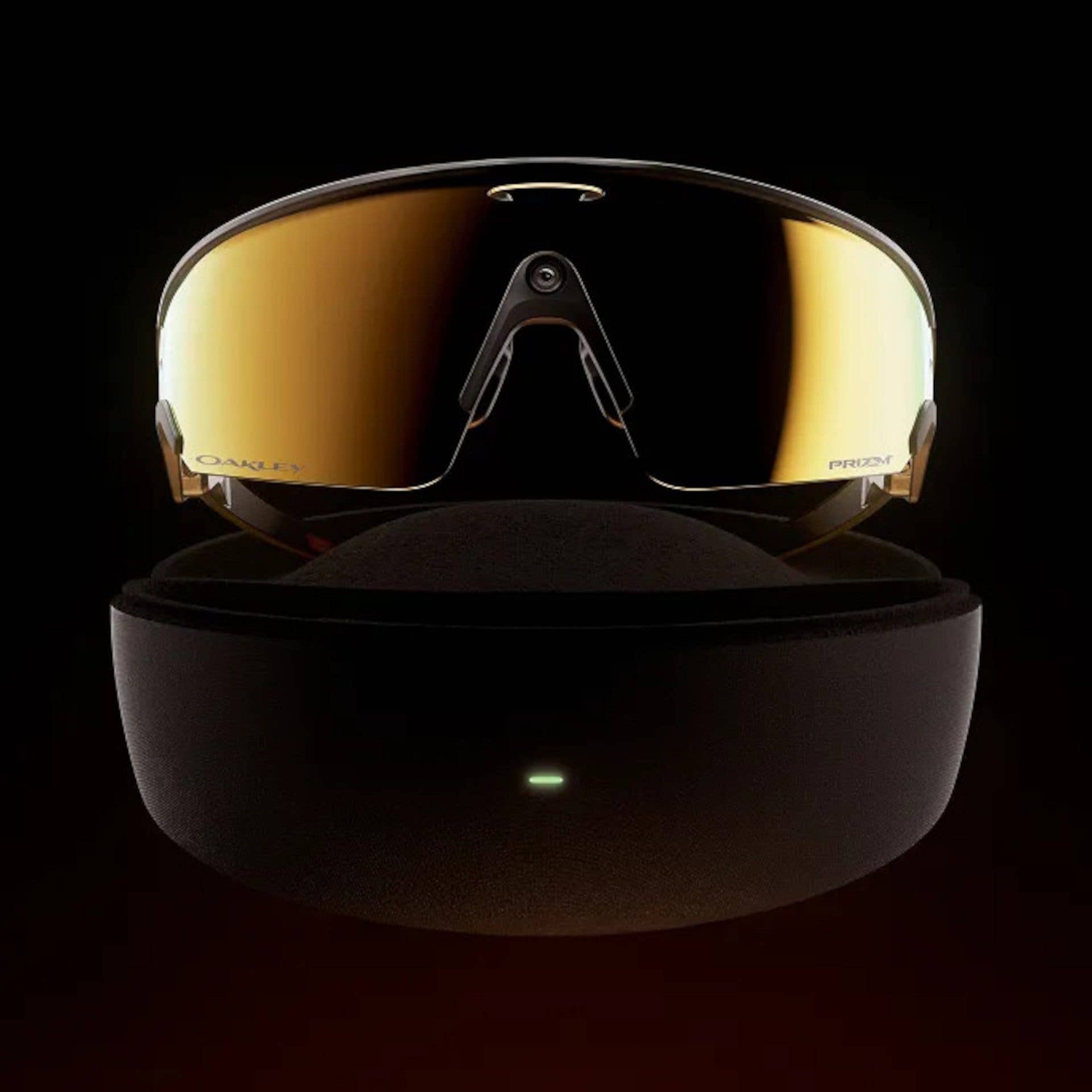 Ein Paar Oakley Meta Vanguard Sonnenbrillen auf einem schwarzen Displayständer.