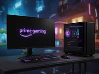 Ein Gaming-Setup mit einem Monitor, auf dem 'prime gaming' angezeigt wird, und einem eleganten PC-Tower mit RGB-Beleuchtung.
