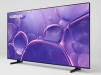 Samsung Crystal UHD Fernseher, der abstrakte lila Blasen zeigt.