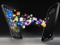 App-Icons fliegen von einem Smartphone aufs andere vor dunklem Hintergrund