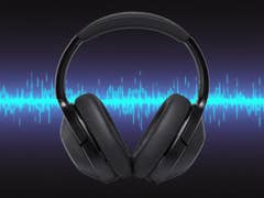 Schwarze Kopfhörer mit einer blauen Schallwelle im Hintergrund.