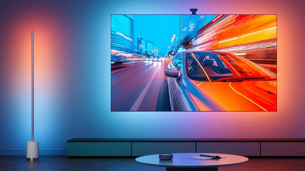 Fernseher mit eingeschaltetem Govee TV Backlight T2, das die Wand passend zum TV-Bild anstrahlt
