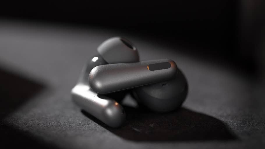 Nahaufnahme der drahtlosen Kopfhörer OnePlus Nord Buds 3 Pro auf einer dunklen Oberfläche.