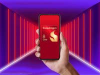 Eine Hand hält ein Smartphone, das das Logo 'Snapdragon 8 Elite Gen 5' vor einem bunten Hintergrund zeigt.